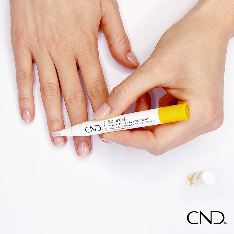 Artistic View of CND SolarOil Care Pen An artistic depiction of the CND SolarOil Care Pen with a subtle background.